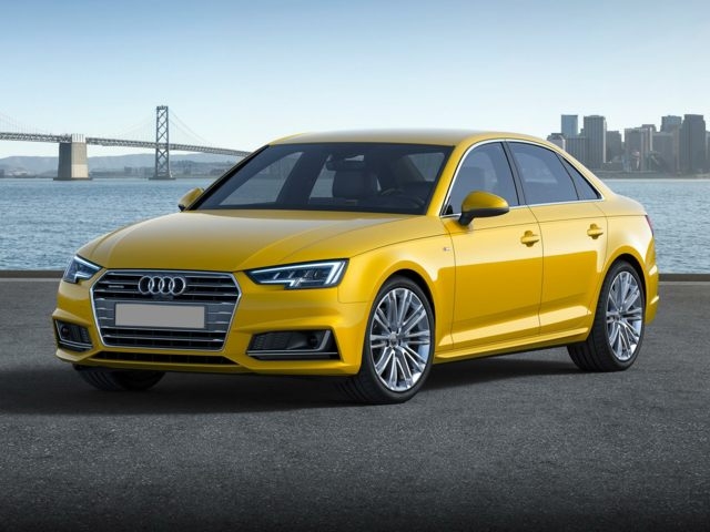 Yellow 2017 Audi A4 on waterfront