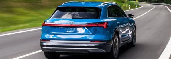2019 audi e tron driving through the country side